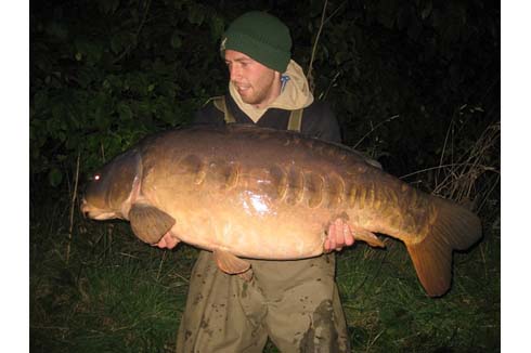 Matt Bryant with The Parrot at 62lb 8oz.jpg